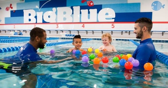 Big Blue Swim School Instructor and Kids